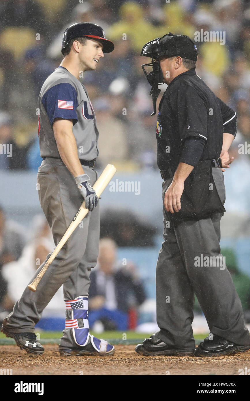 Los Angeles, CA, USA. 21st Mar, 2017. United States catcher Buster Posey #28 argues with home ump Rob Dranke after being called out on strikes in the game between the the United States and Japan, World Baseball Classic Semi-Finals, Dodger Stadium in Los Angeles, CA. Peter Joneleit /CSM/Alamy Live News Stock Photo