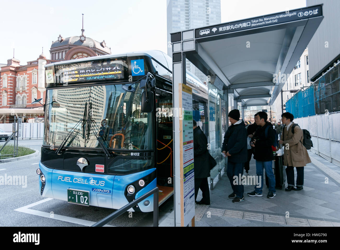 People enter a hydrogen fuel cell bus at Tokyo Station on March 22, 2017, Tokyo, Japan. From
