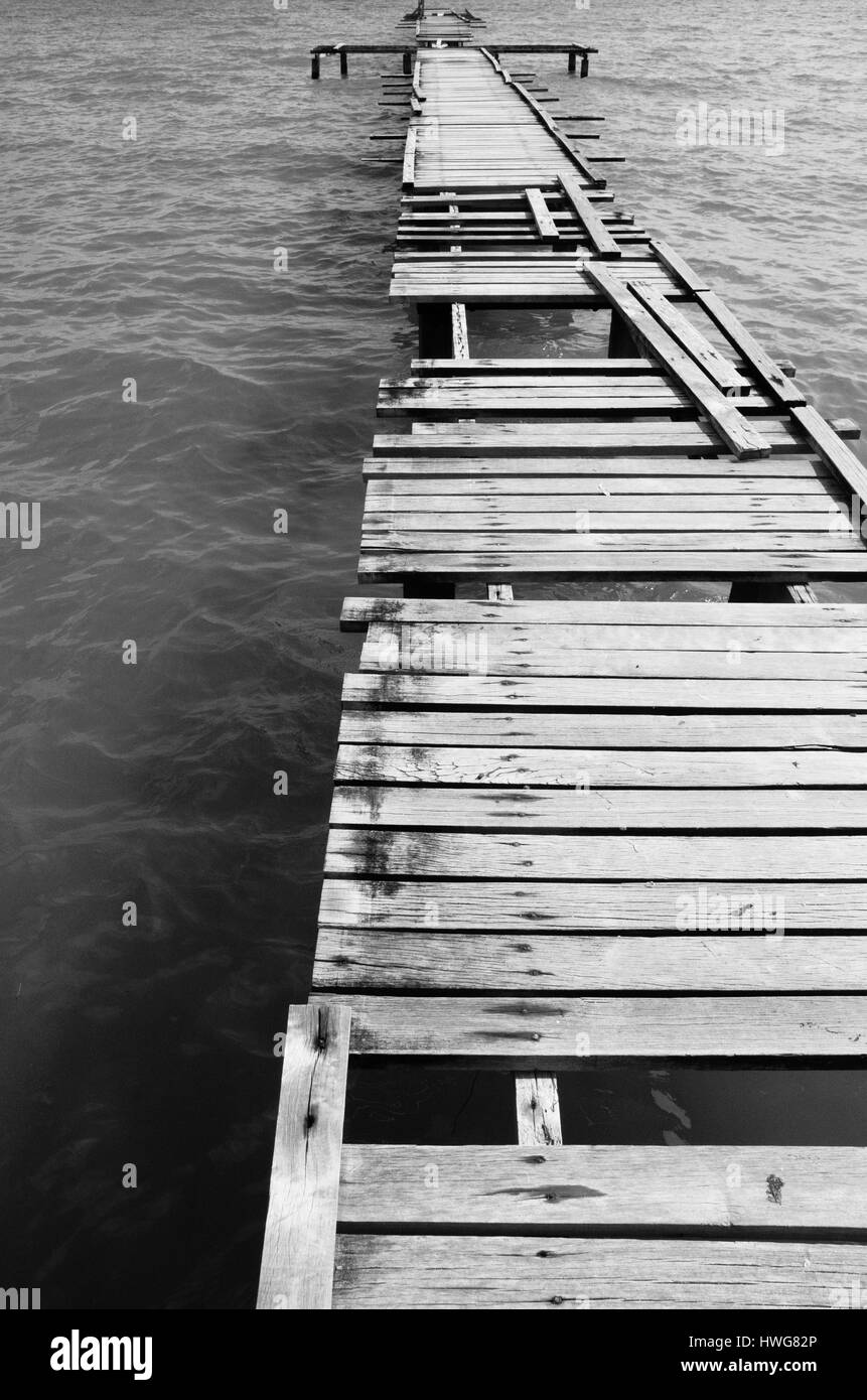 Wooden pier on the sea background Stock Photo