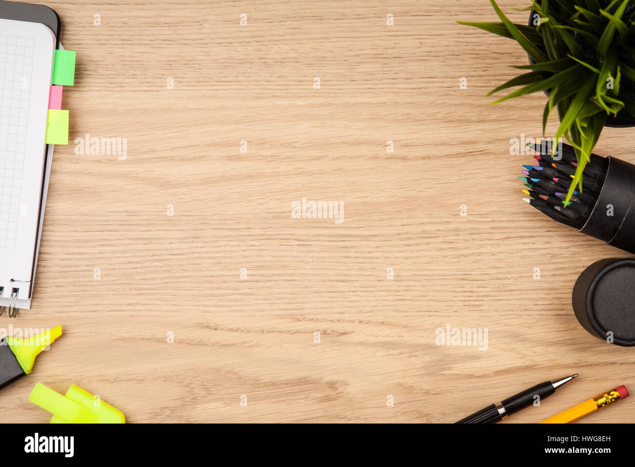 Open notepad with office supplies Stock Photo Alamy