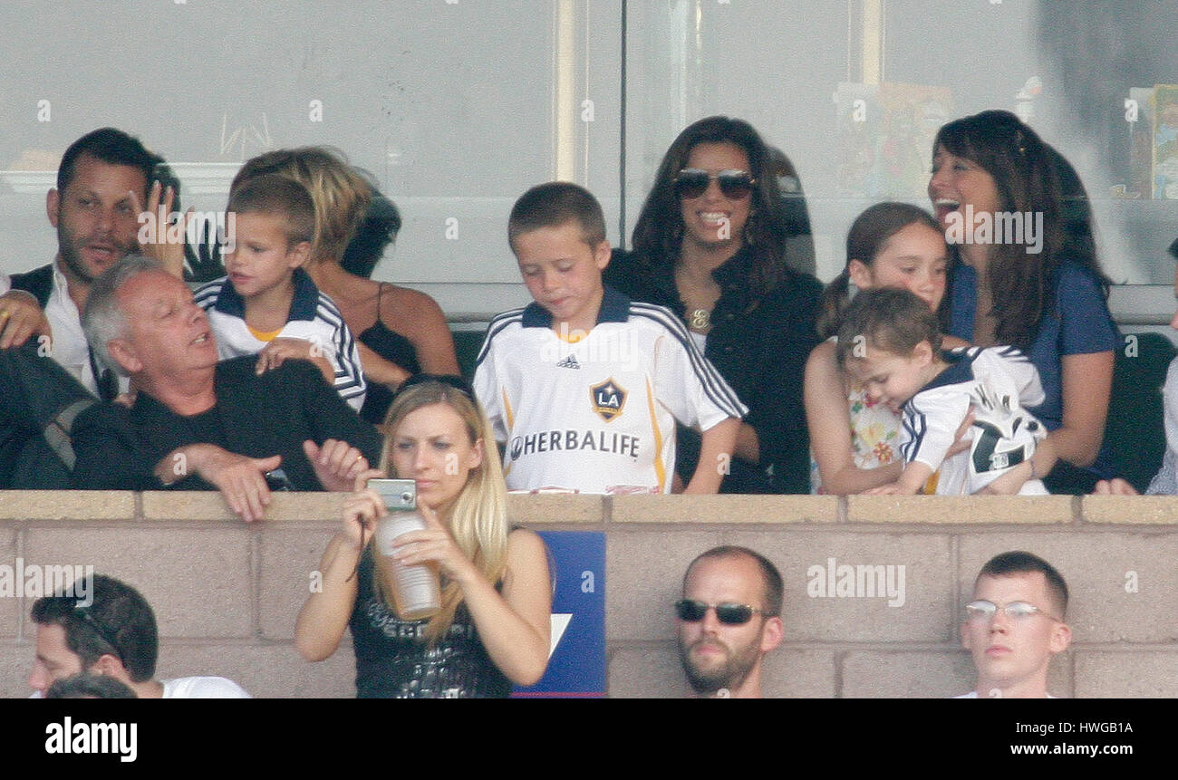 David Beckham's sons, Brooklyn, center, Romeo, left, and Cruz watch the Los Angeles Galaxy play Chelsea with Eva Longoria, background with sunglasses, at the Home Depot Center in Carson, CA on Saturday, July 21, 2007. Photo credit: Francis Specker Stock Photo