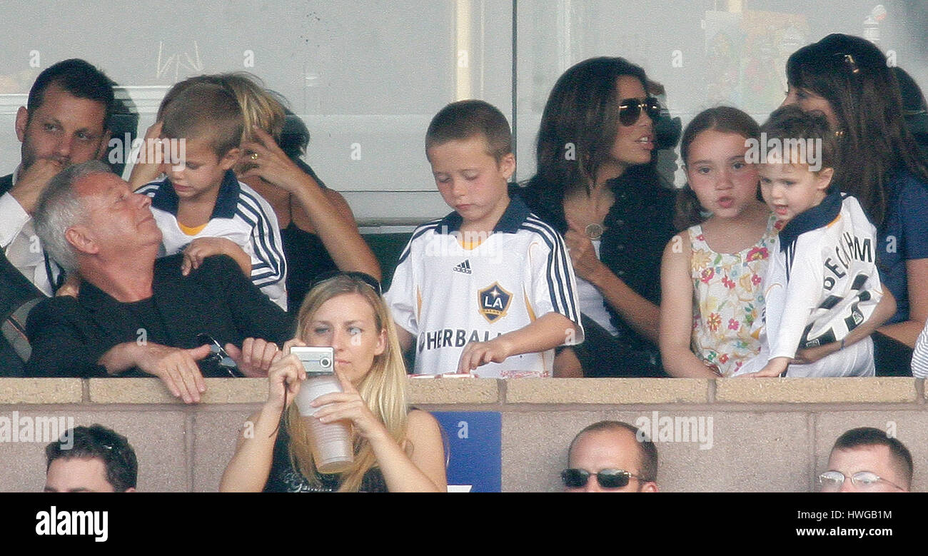 David Beckham's sons, Brooklyn, center, Romeo, left, and Cruz watch the Los Angeles Galaxy play Chelsea with Eva Longoria, background with sunglasses, at the Home Depot Center in Carson, CA on Saturday, July 21, 2007. Photo credit: Francis Specker Stock Photo