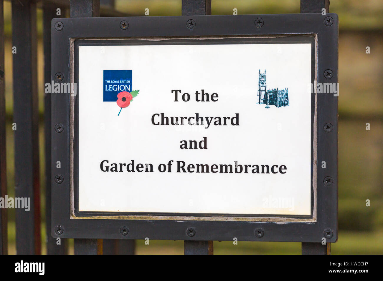 Cirencester - To the Churchyard and Garden of Remembrance sign on gate at St John the Baptist Church, Cirencester, Gloucestershire in March Stock Photo