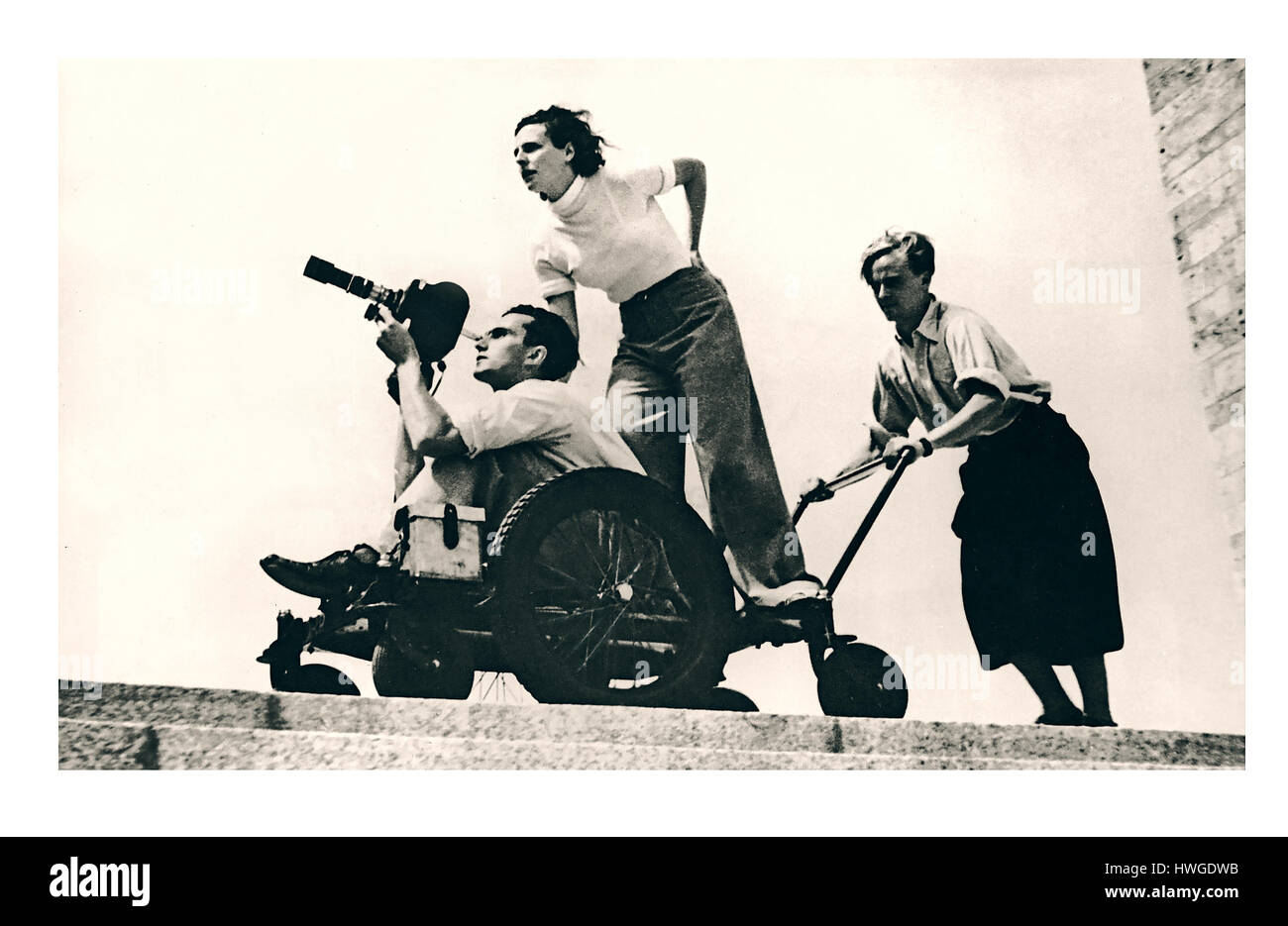 Leni Riefenstahl (centre) directing the cameraman during the filming of the 1936 Berlin Olympics, Stock Photo