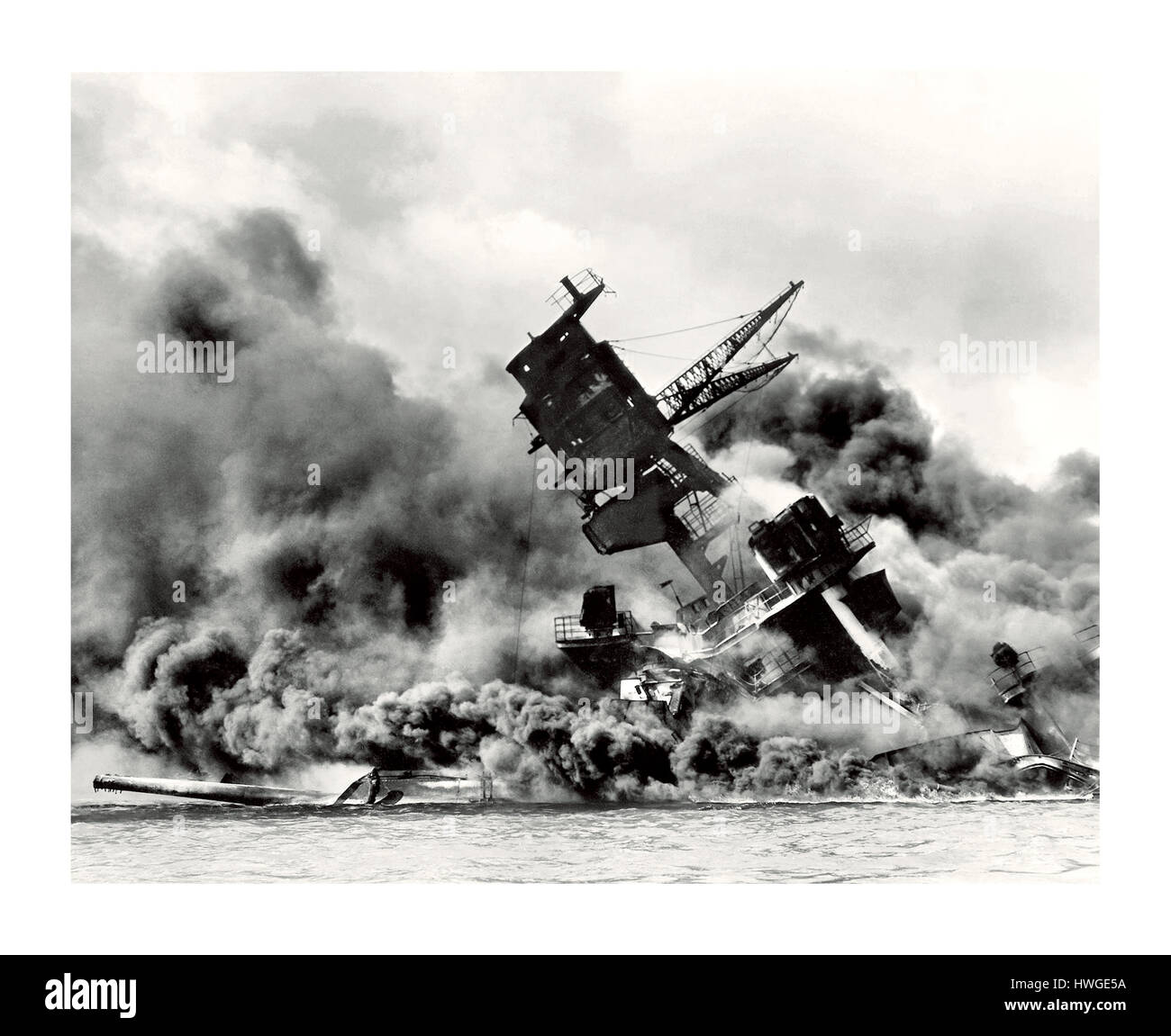 PEARL HARBOR ATTACK Japanese  attack on Pear Harbor 7th December 1941 USS Arizona Battleship BB-39 battleship on fire and sinking Stock Photo