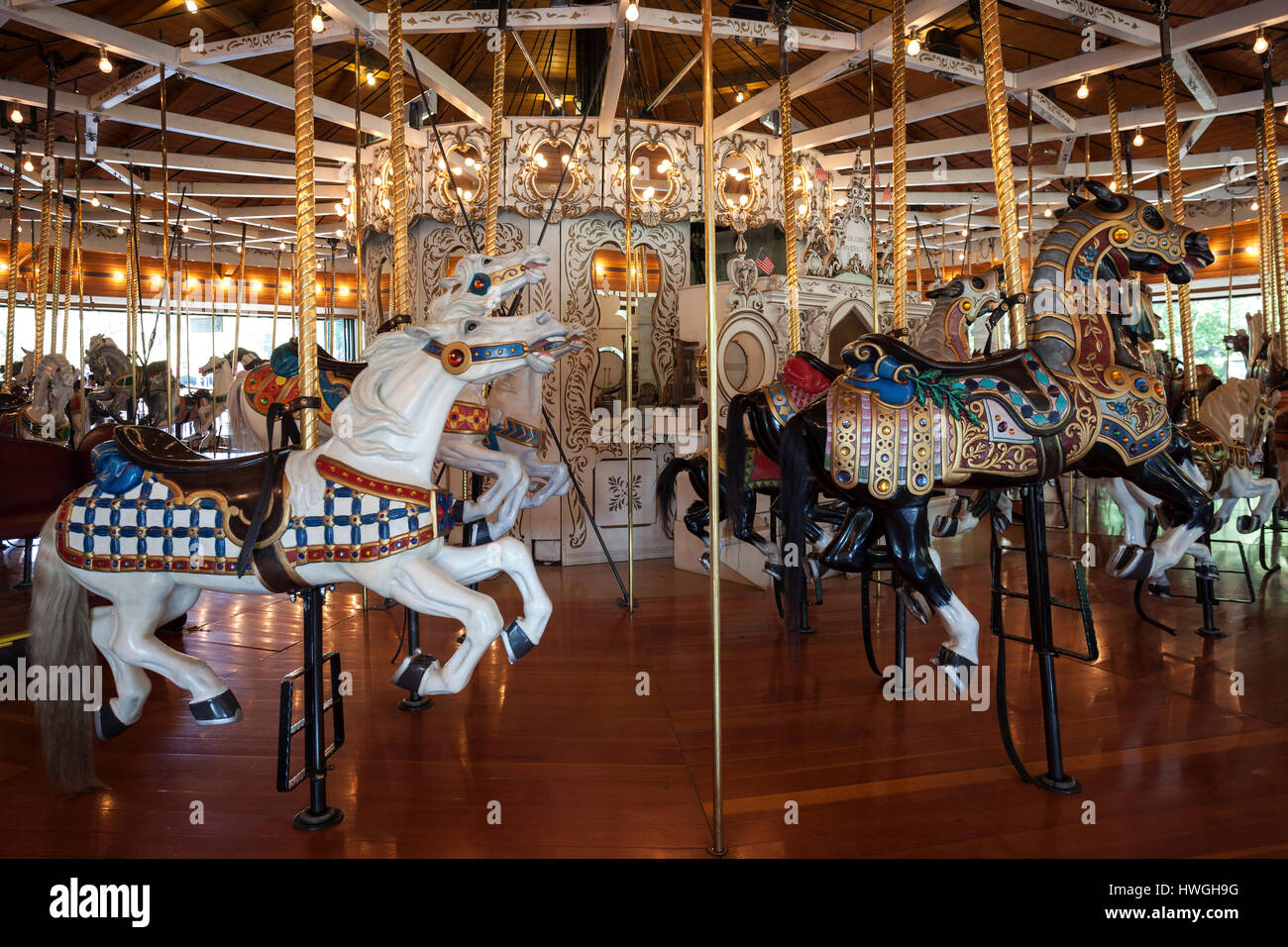 Historical children's merry-go-round with horses, Spokane, Washington, USA Stock Photo