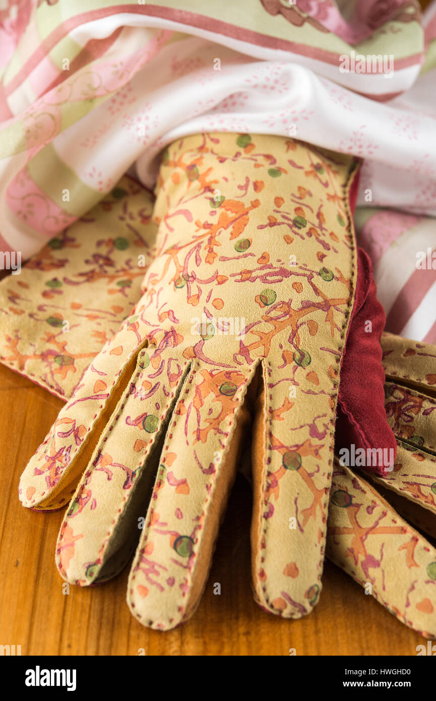 Block printing, leather gloves with different printed patterns and colors, finished printed silk scarf above, Bad Aussee, Styria Stock Photo