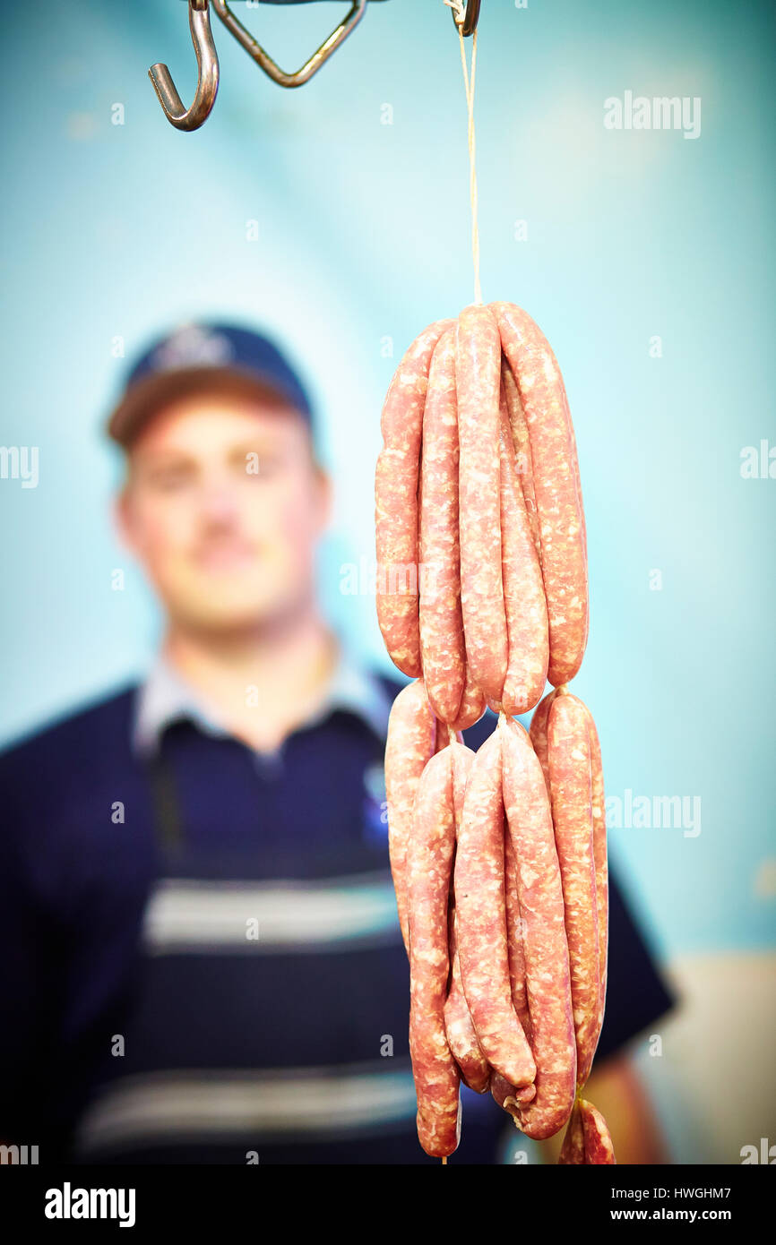 Butcher with his handmade sausages Stock Photo Alamy