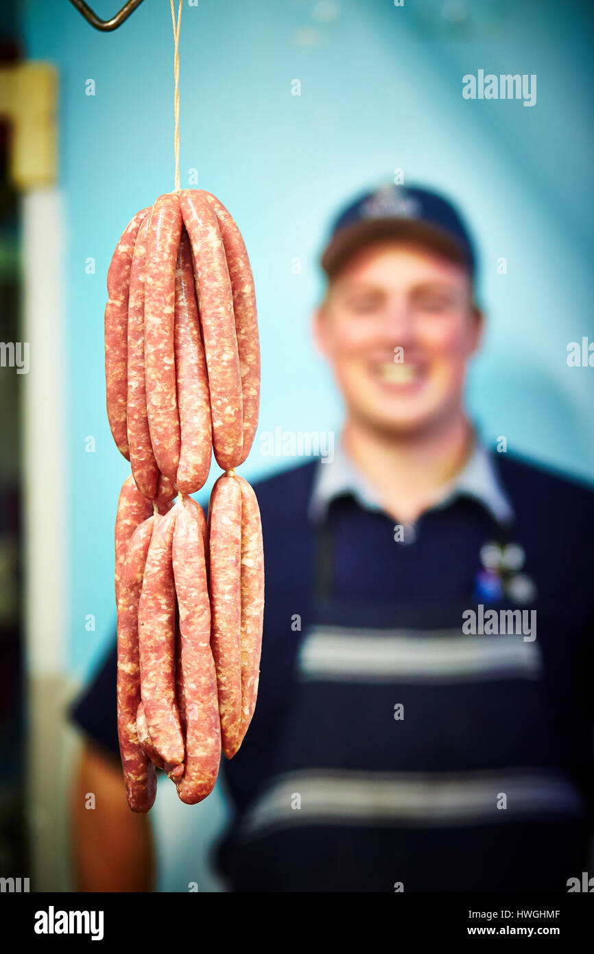 Butcher with his handmade sausages Stock Photo Alamy