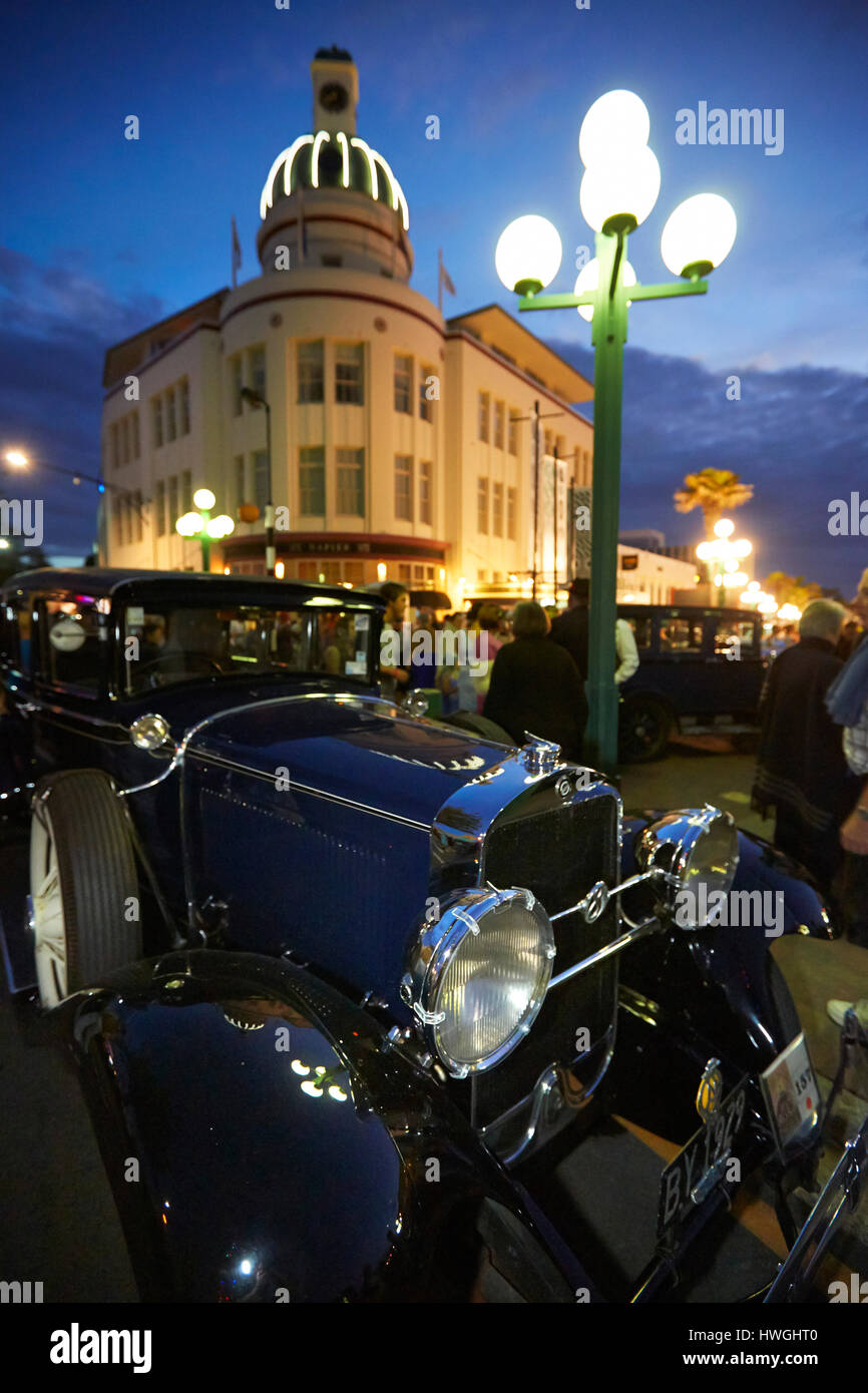 Napier dome building with art deco car at festival, evening time Stock Photo