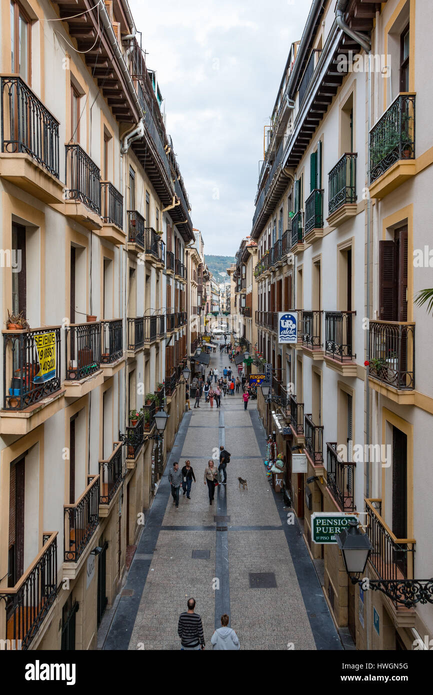 Balconies and windows on a narrow street in San Sebastian Stock Photo ...