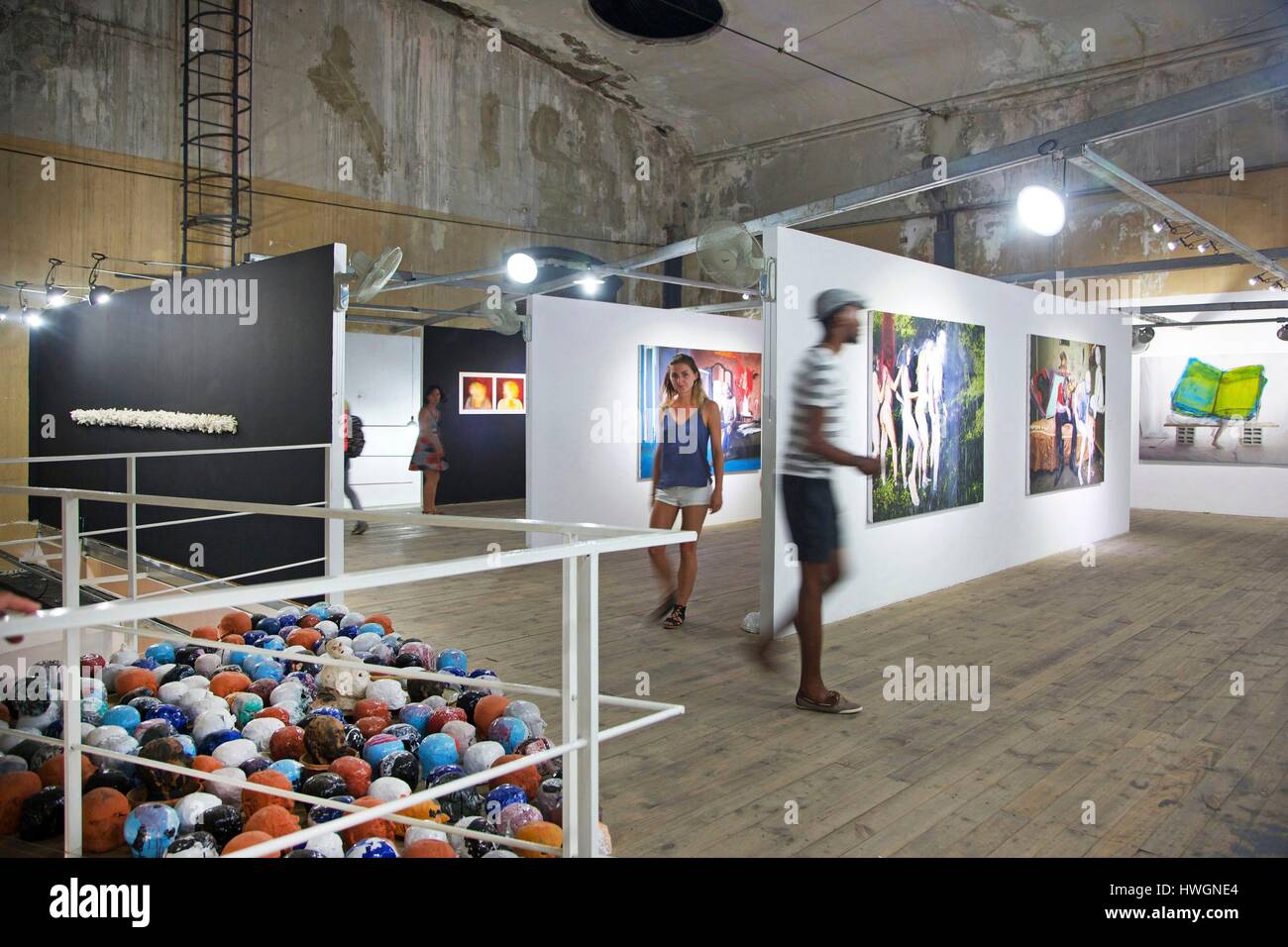 Cuba, La Havana, Vedado, young people in the exhibition room of the Fabrica de arte cubano Stock Photo