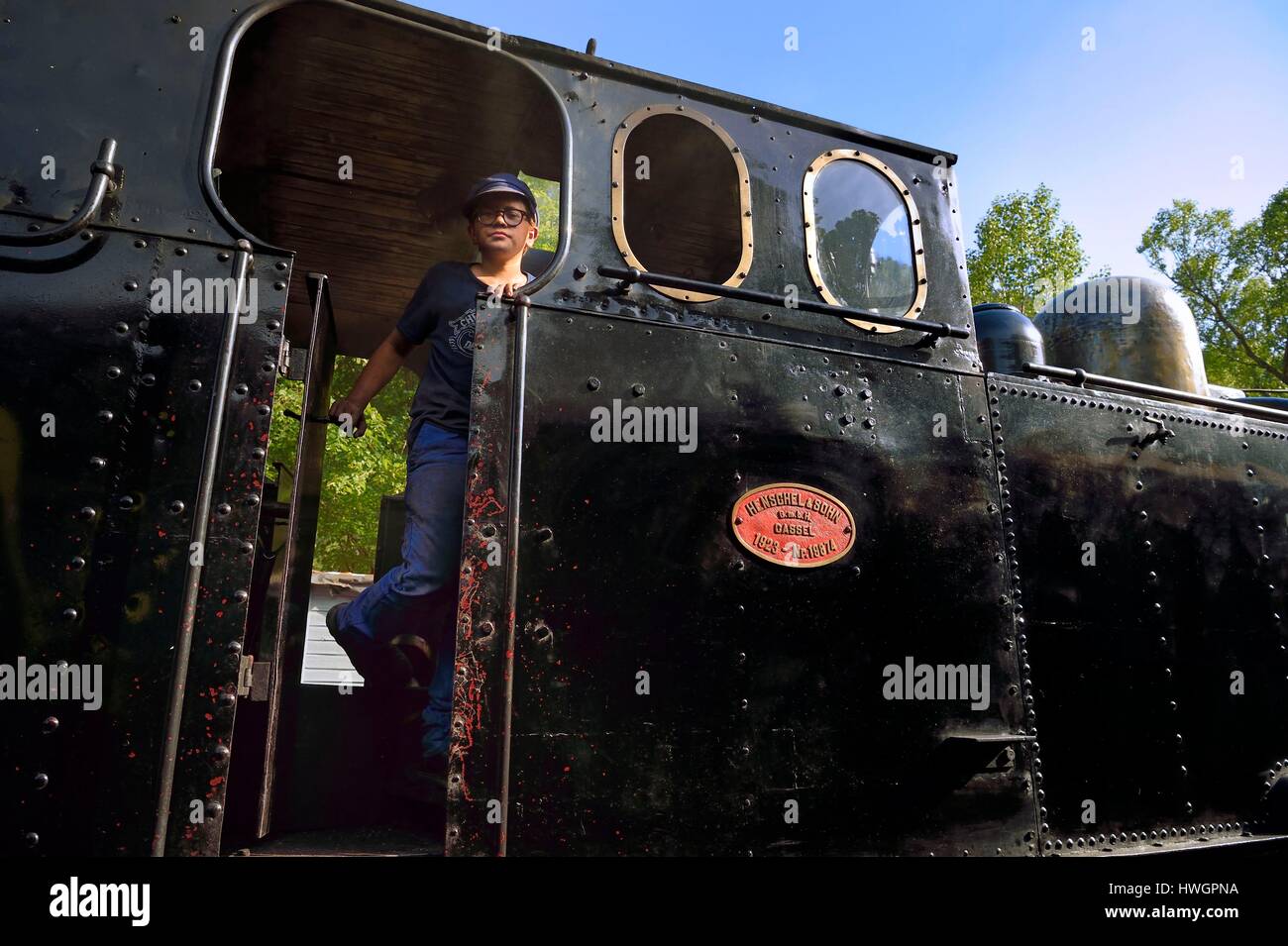 France, Alpes Maritimes, Puget Theniers, steam engine warming up, Benoit Prudhomme-Lacroix Lacroix is one of the youngest volunteers of the G.E.C.P. that restores and operates the Train des Pignes historic train Stock Photo