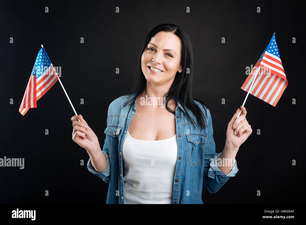 American patriot holding up hi-res stock photography and images - Alamy