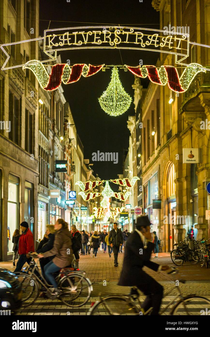 Netherlands, Amsterdam, Kalverstraat street, Holiday decorations, evening Stock Photo