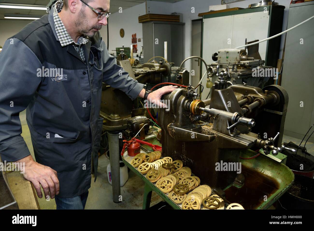 France, Doubs, Chatillon le Duc, Manufacture of watchmaking Vuillemin, manufacture of clock movements Comtoises and design, cutting of a barrel wheel for clocks Stock Photo