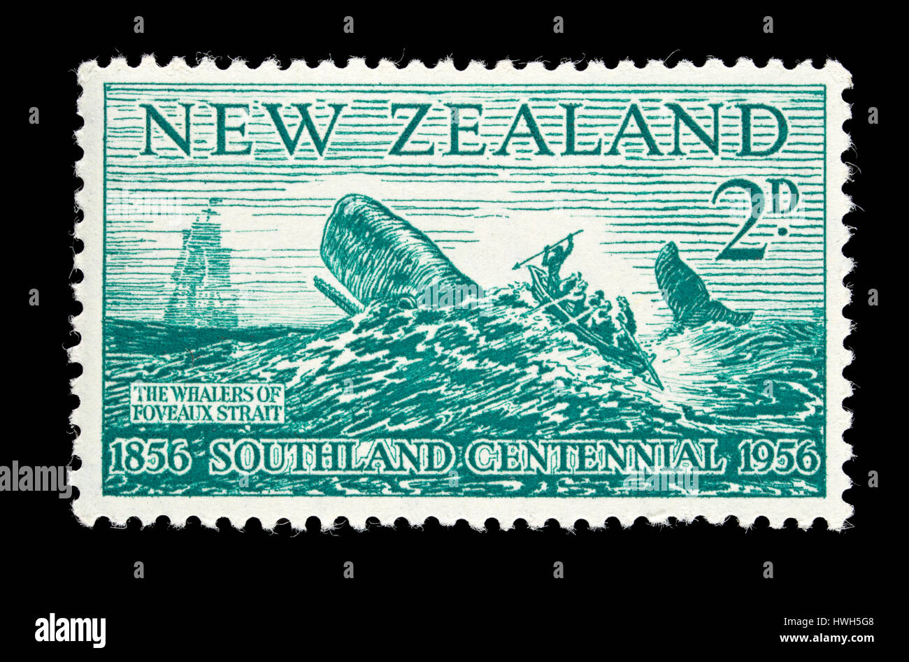 Postage stamp from New Zealand depicting whalers at Foveaux Strait, centennial of Southland. Stock Photo