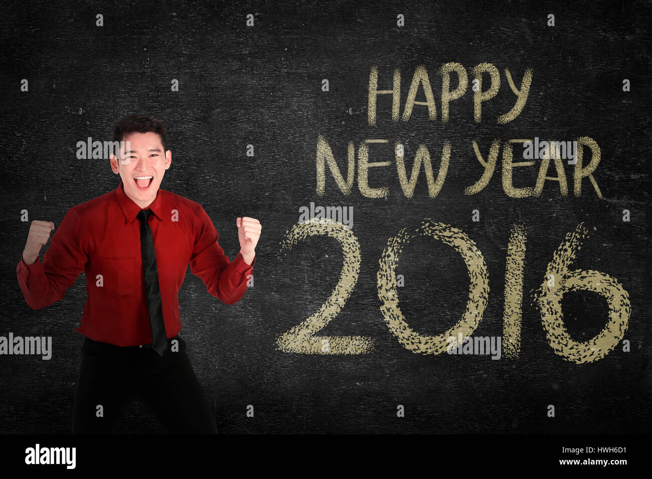 Business man in front of happy new year 2016 writing. New year concept Stock Photo