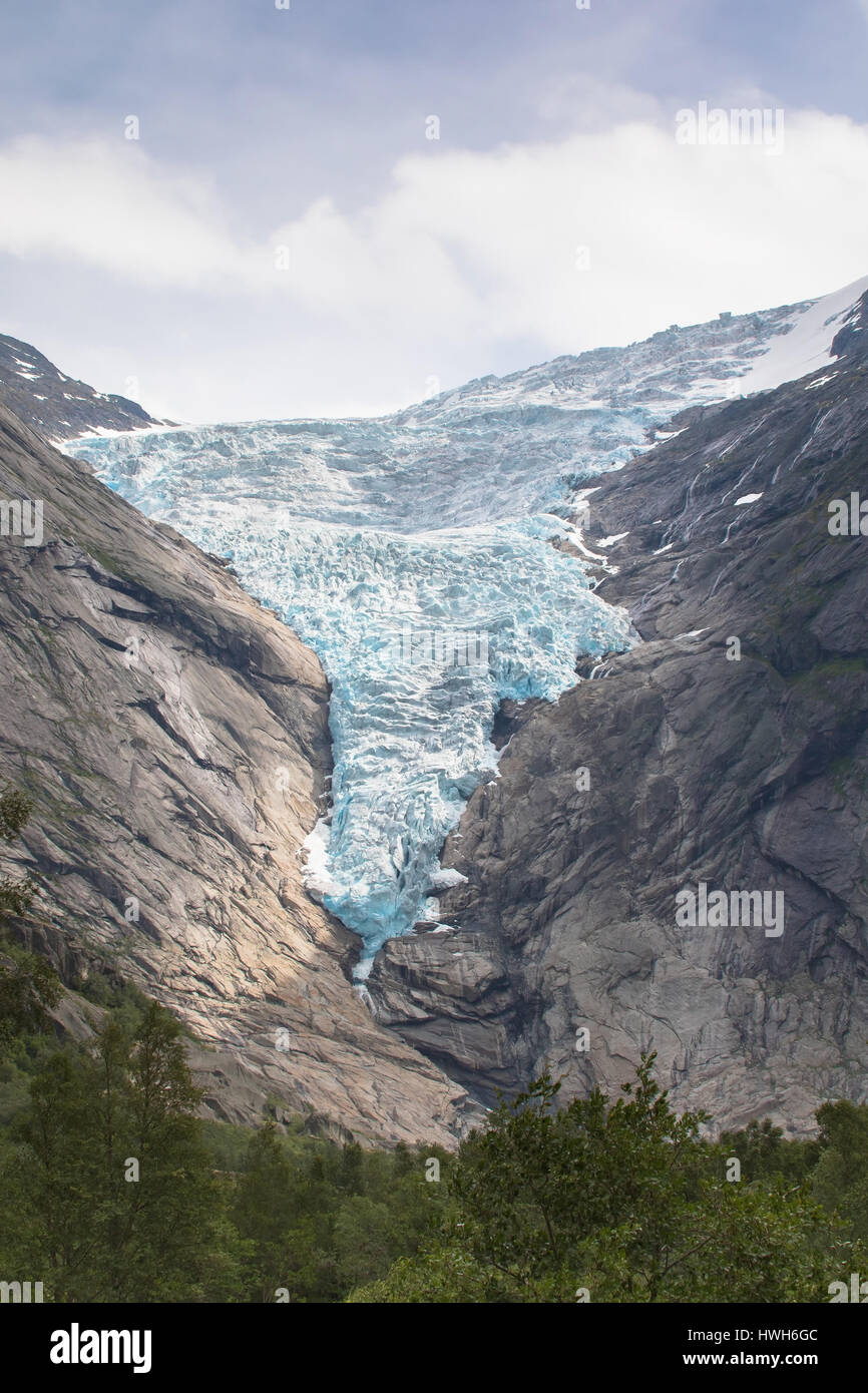 Glacier Briksdalsbreen, Norway, Sogn og Fjordane, Briksdalsbreen, glacier, columns, climate, mountains, weather, clouds, wood, scenery, Norway, Sogn o Stock Photo