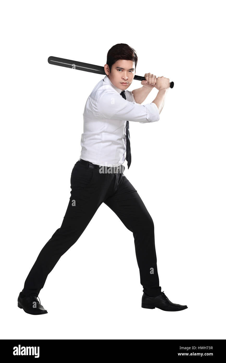 Young business man holding baseball bat isolated over white background  Stock Photo - Alamy