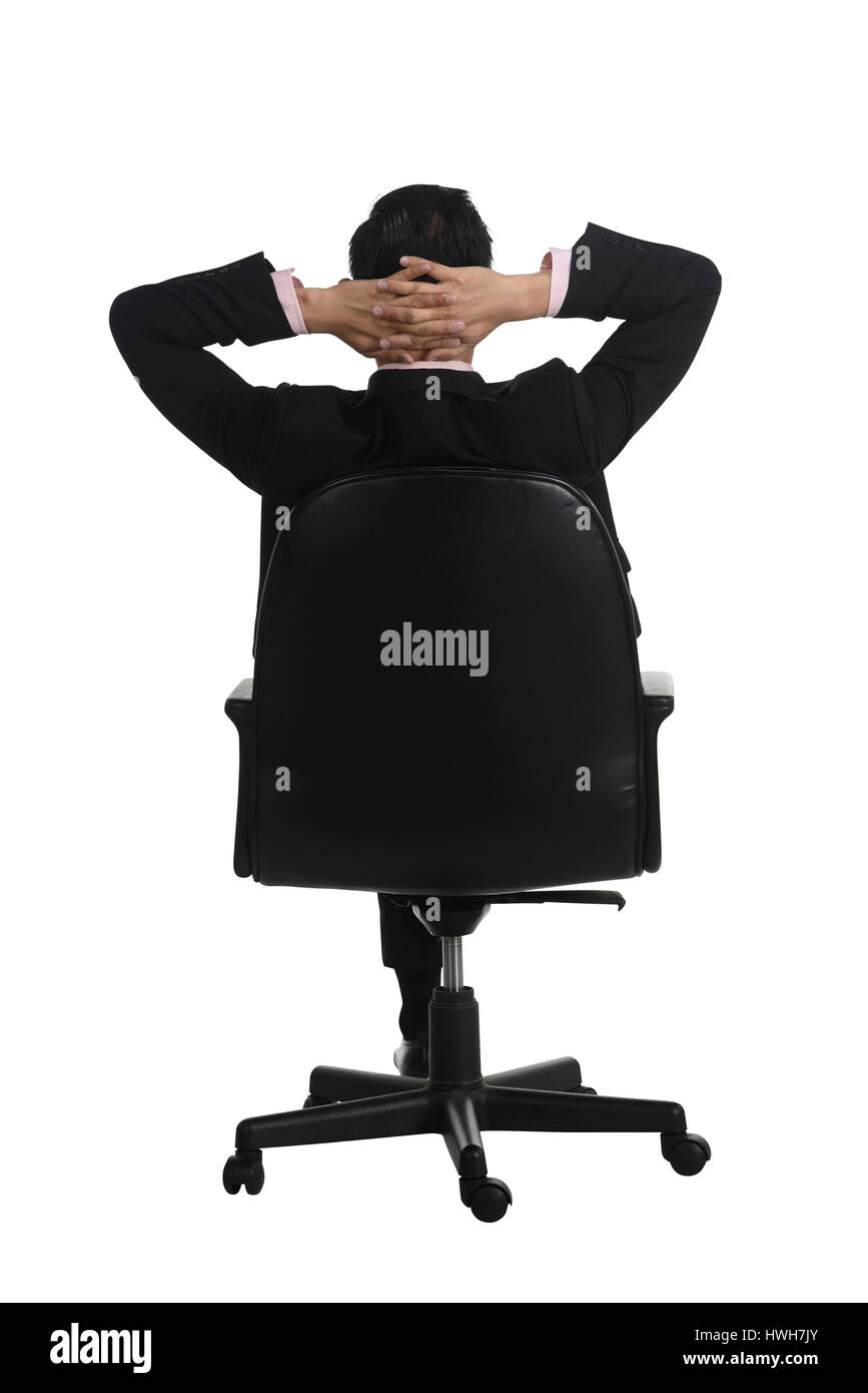 Backview of business man sitting on the chair isolated over white background Stock Photo