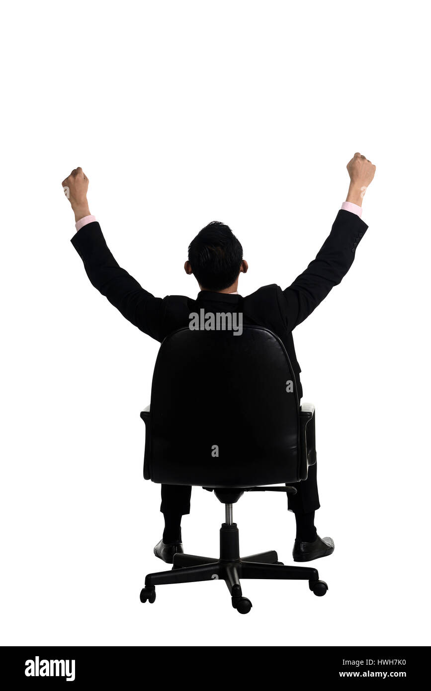 Backview of business man raise hand sitting on the chair isolated over white background Stock Photo