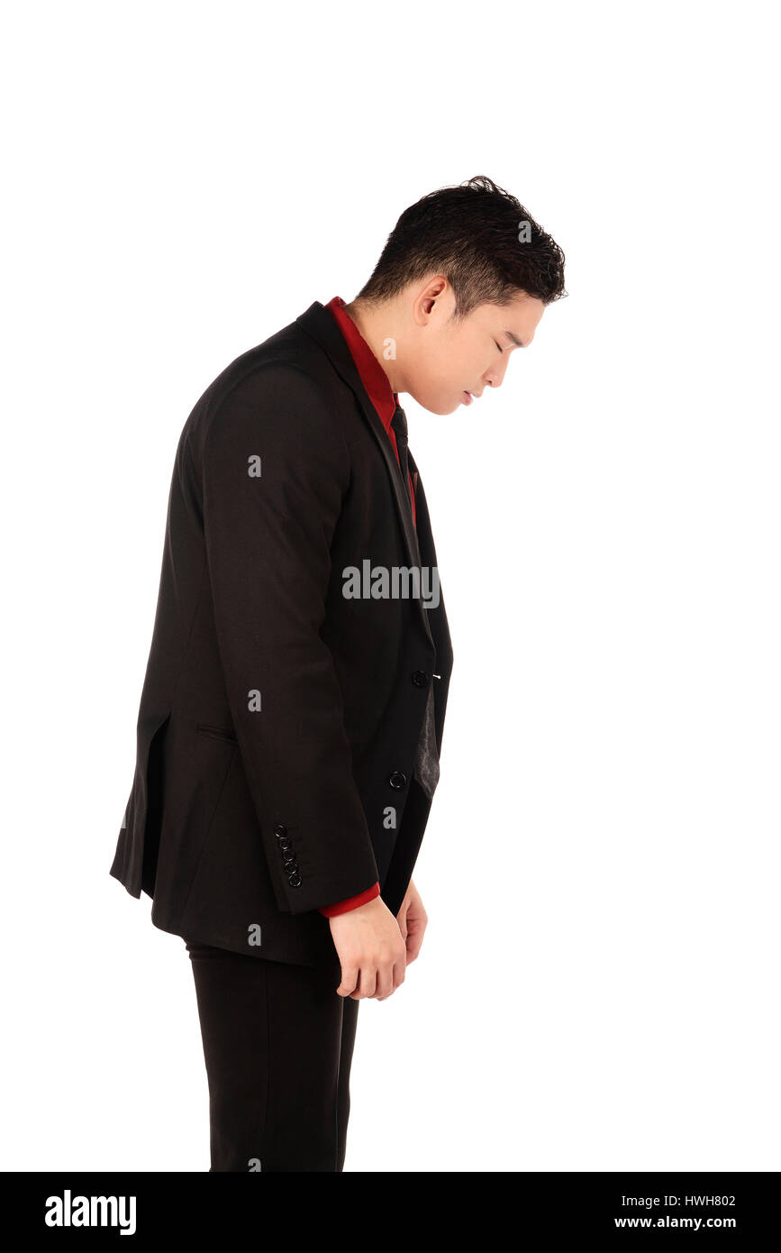 Asian business man depression isolated over white background Stock Photo
