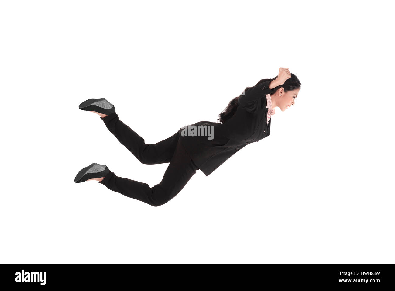 Falling and screaming business woman in formal wear over white background Stock Photo