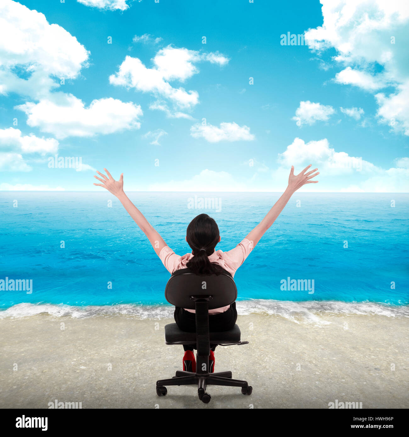 Young business woman relaxing on the beach. The office floor transform