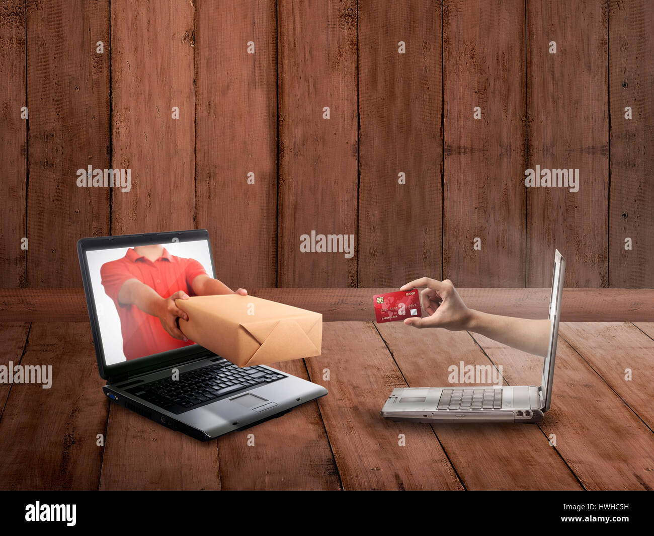 Hand Giving A Box Out Of Laptop Screen Online Shopping Concept Stock Photo Alamy