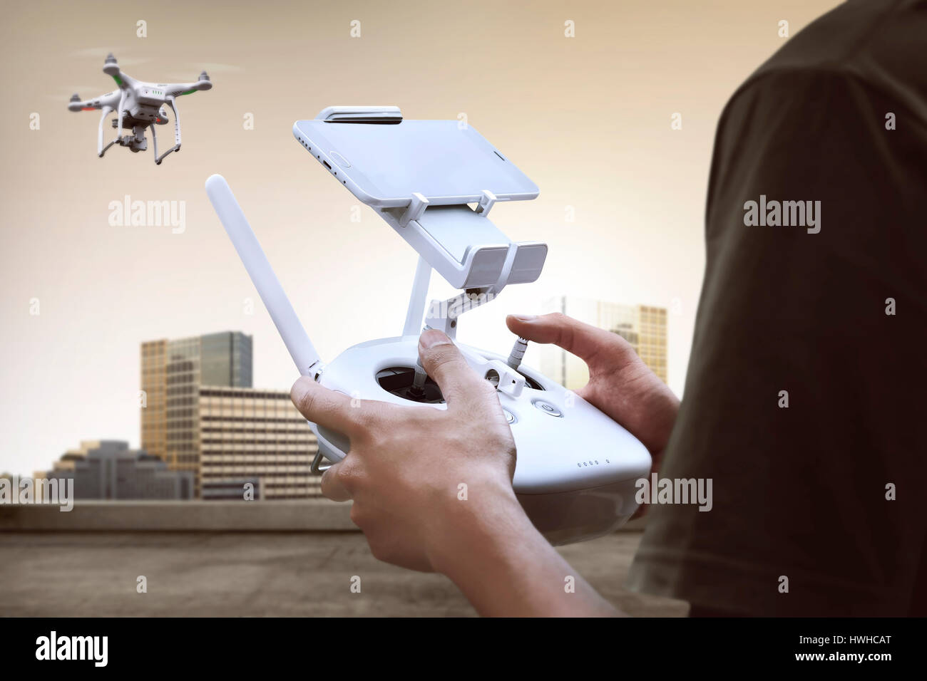 Male pilot controlling drone with remote control Stock Photo Alamy