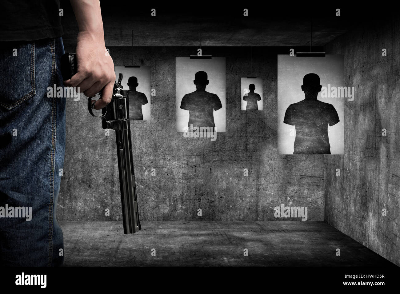 Man hand holding gun Stock Photo Alamy