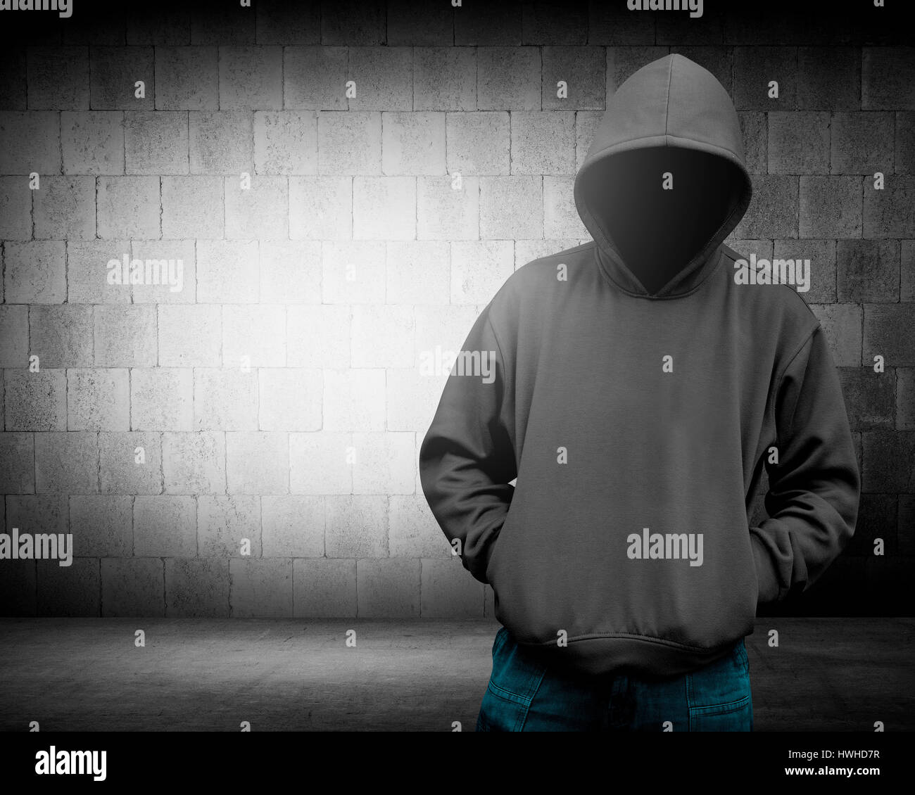 Computer hacker silhouette of hooded man. Threat of your security Stock Photo