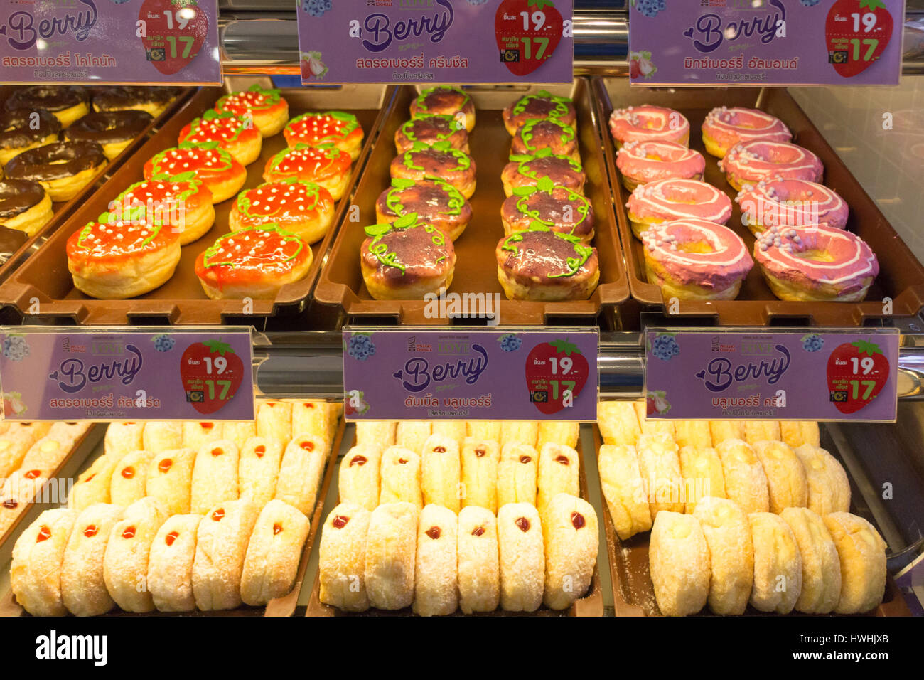 Trays of freshly made donuts for sale at Mister Donut stand in Central