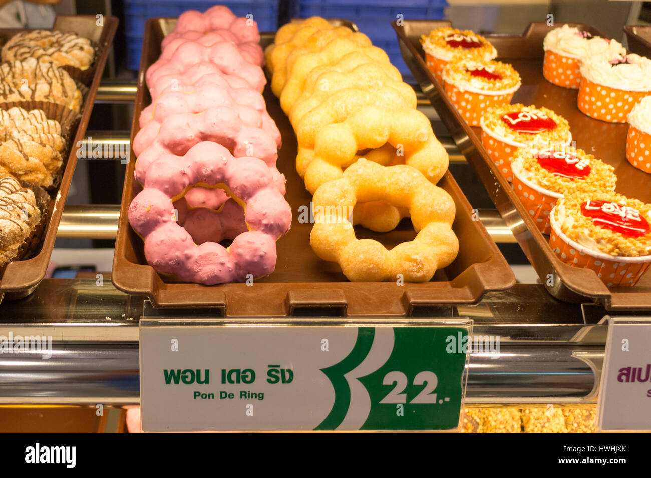 trays-of-freshly-made-donuts-for-sale-at-mister-donut-stand-in-central