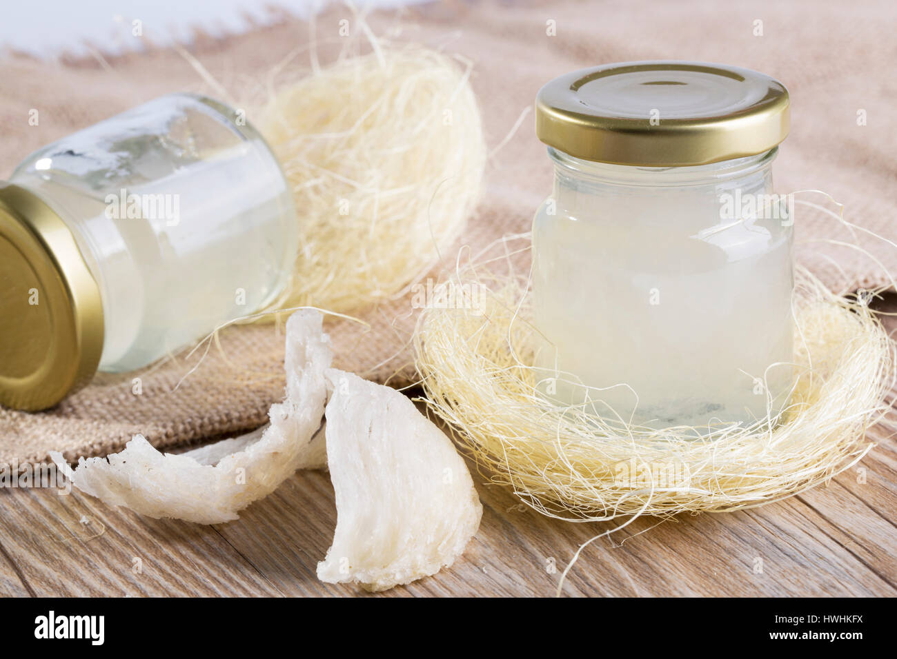 Edible Birdnest in transparent glass bottle on the table, Useing modern