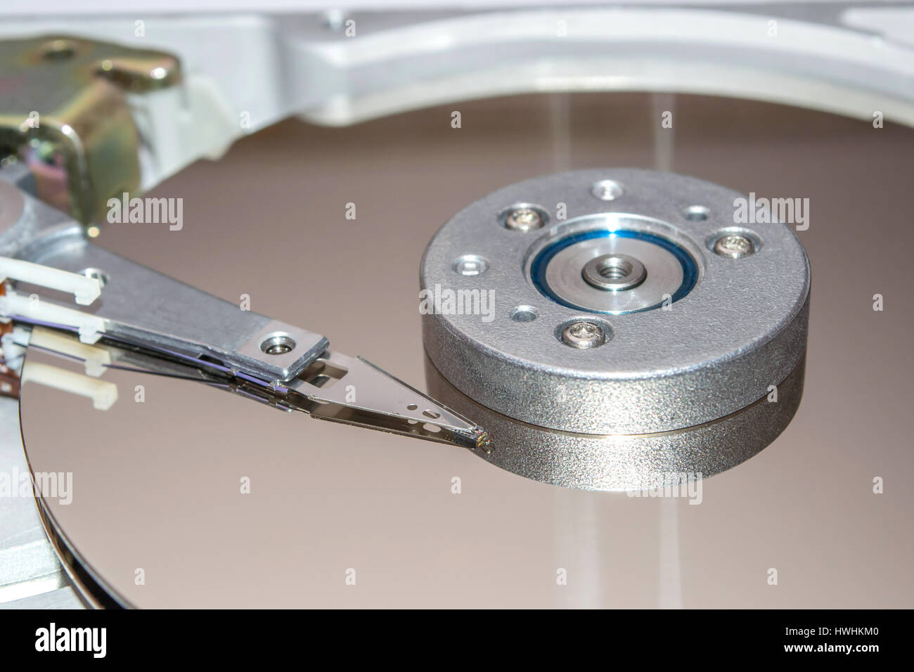 Closeup of inside of a hard disk drive HDD. Stock Photo