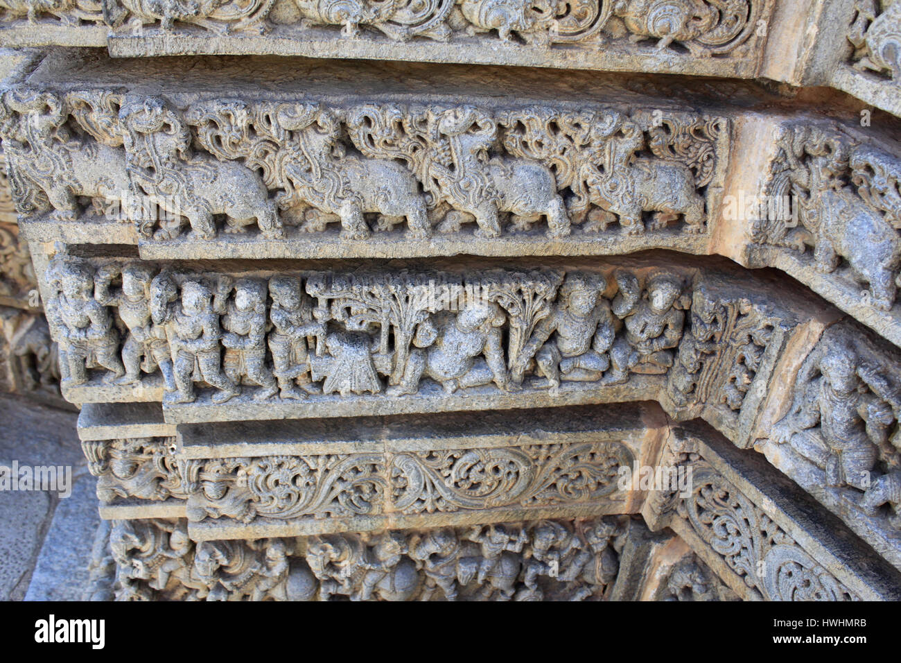 Close up of the Wall panel relief and molding frieze in horizontal treatment depicting makara(imaginary beast), Hindu puranas, and scroll at the Chenn Stock Photo