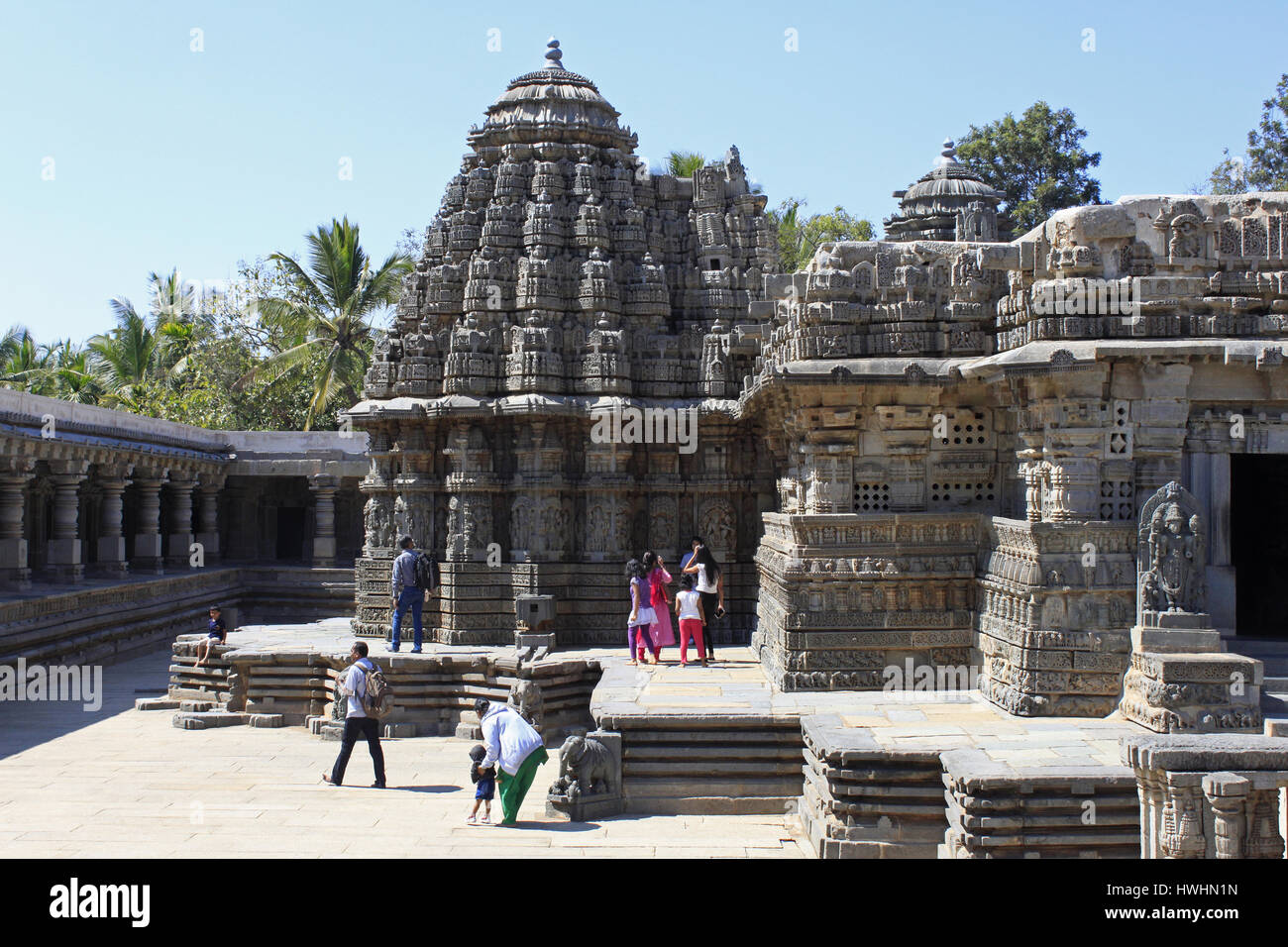 Side view façade, showcasing stellate design towers, ornamented, detailed stone carvings, at Chennakesava Temple, Hoysala Architecture, Somanathpur, K Stock Photo