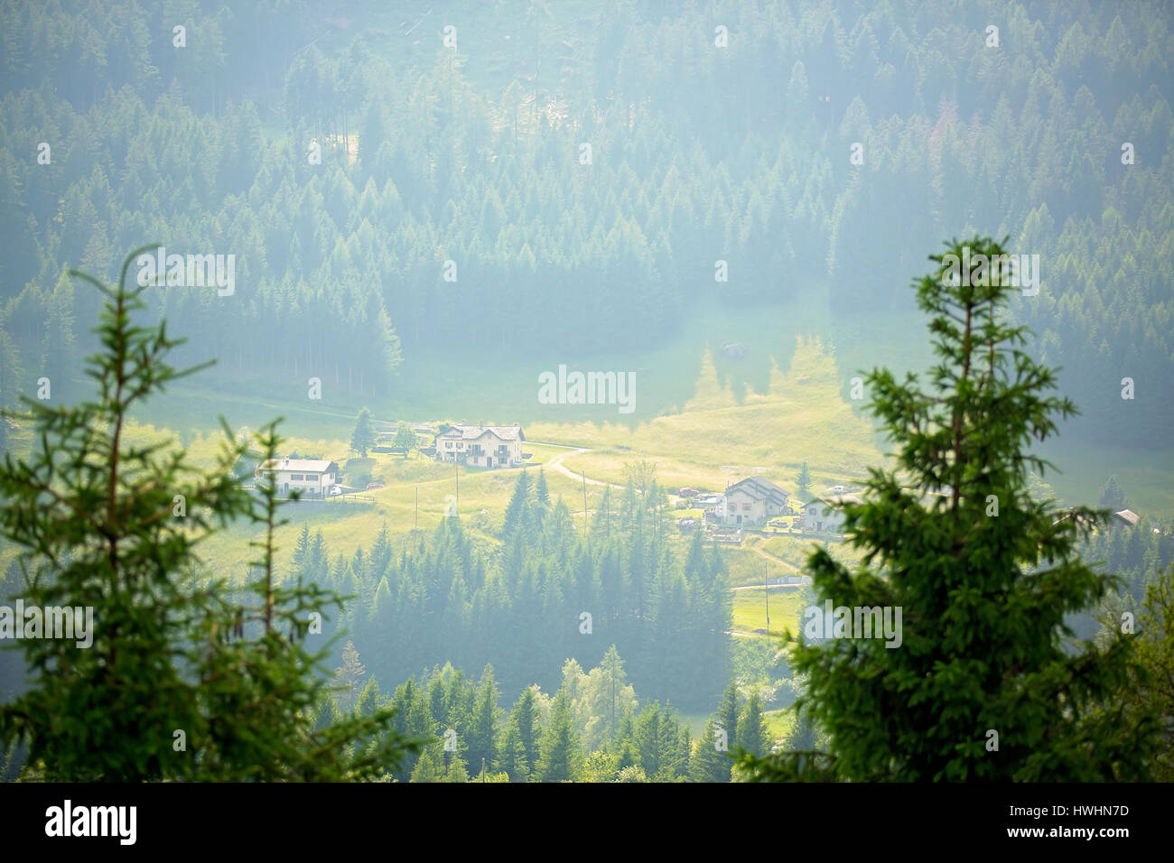 Landscape view of a little village in Swiss Alps on sunset, Switzerland ...