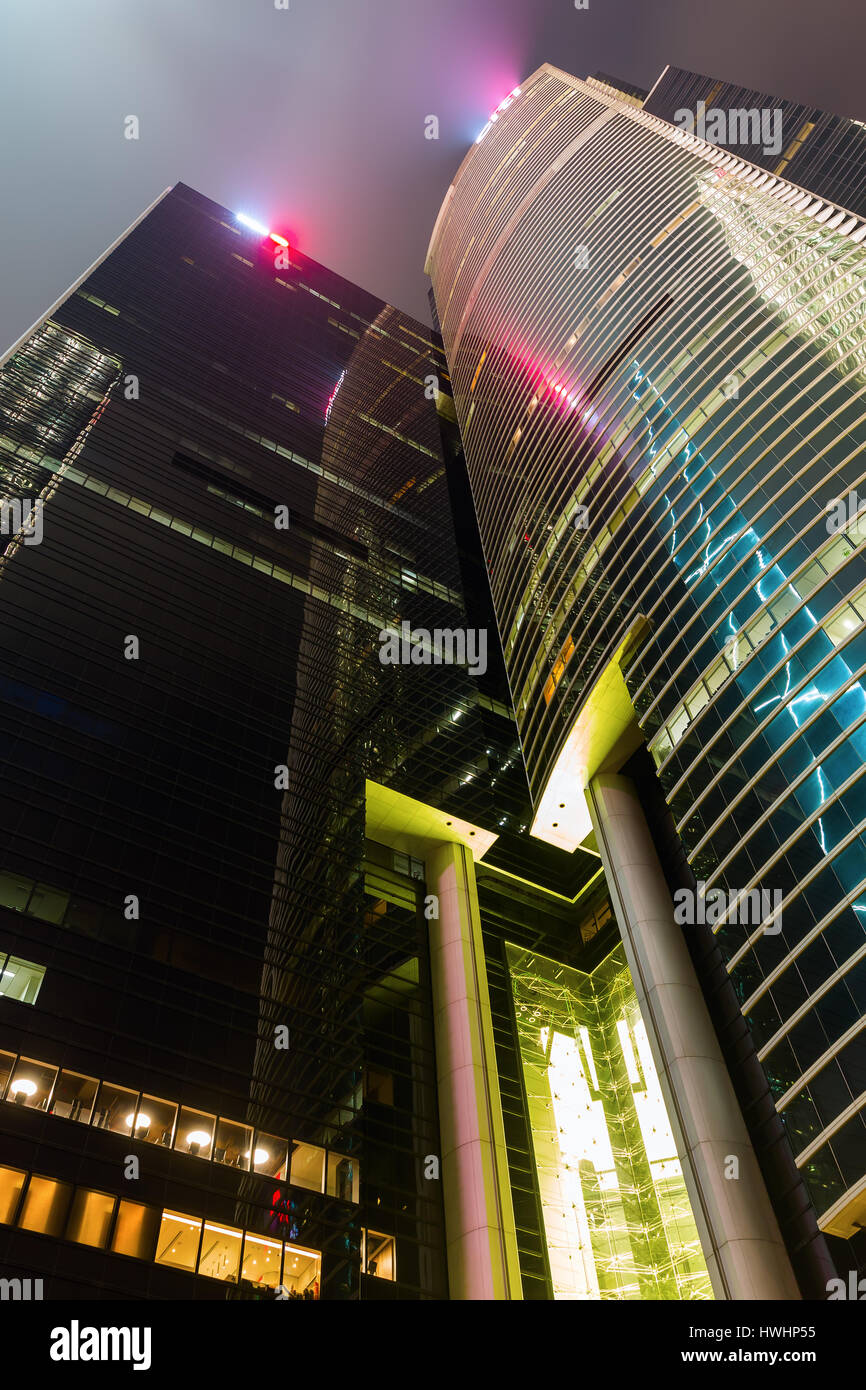 Hong Kong, Hong Kong - March 12, 2017: night cityscape with skyscrapers in Hong Kong central district. Hong Kong is one of worlds most significant fin Stock Photo