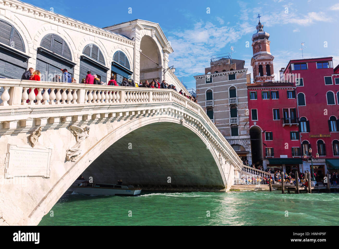 Venice, Italy - February 27, 2017: Rialto Bridge at the Grand Canale with unidentified people. Venice is world renown for the beauty of its settings,  Stock Photo