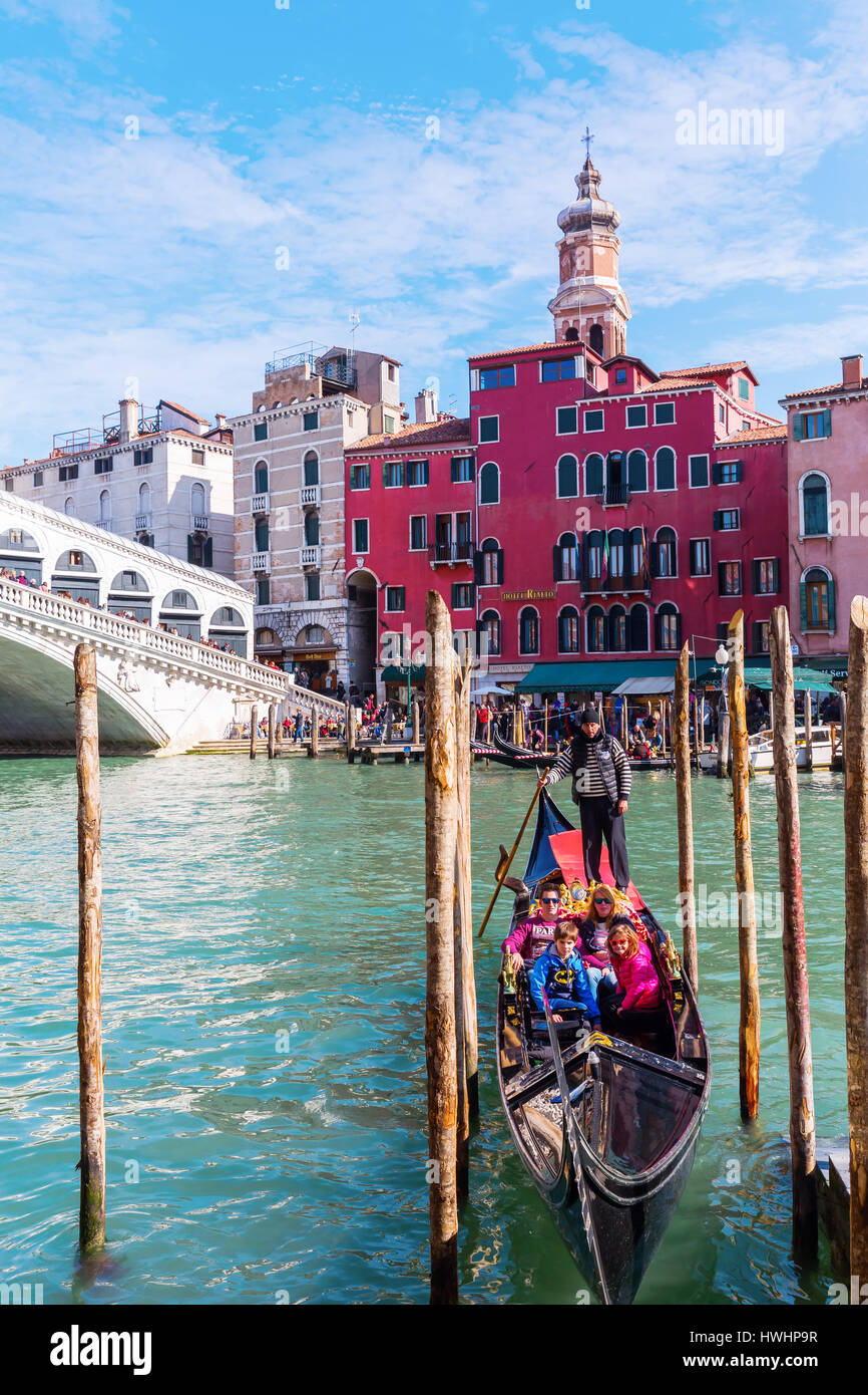 Venice, Italy - February 27, 2017: Rialto Bridge at the Grand Canale with unidentified people. Venice is world renown for the beauty of its settings,  Stock Photo