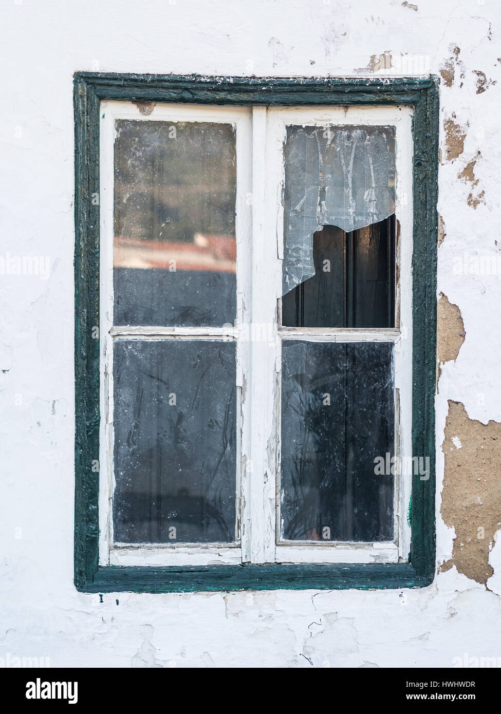 Window of an abandoned house in a village in Alentejo, Portugal Stock Photo