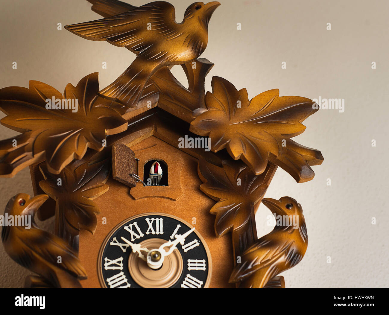 A cuckoo clock on a wall Stock Photo Alamy