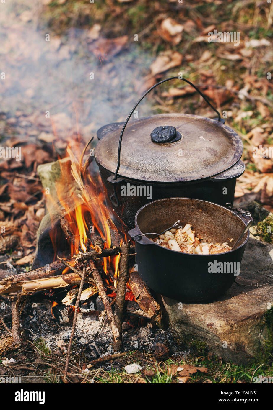 boiler with food standing on fire Stock Photo Alamy