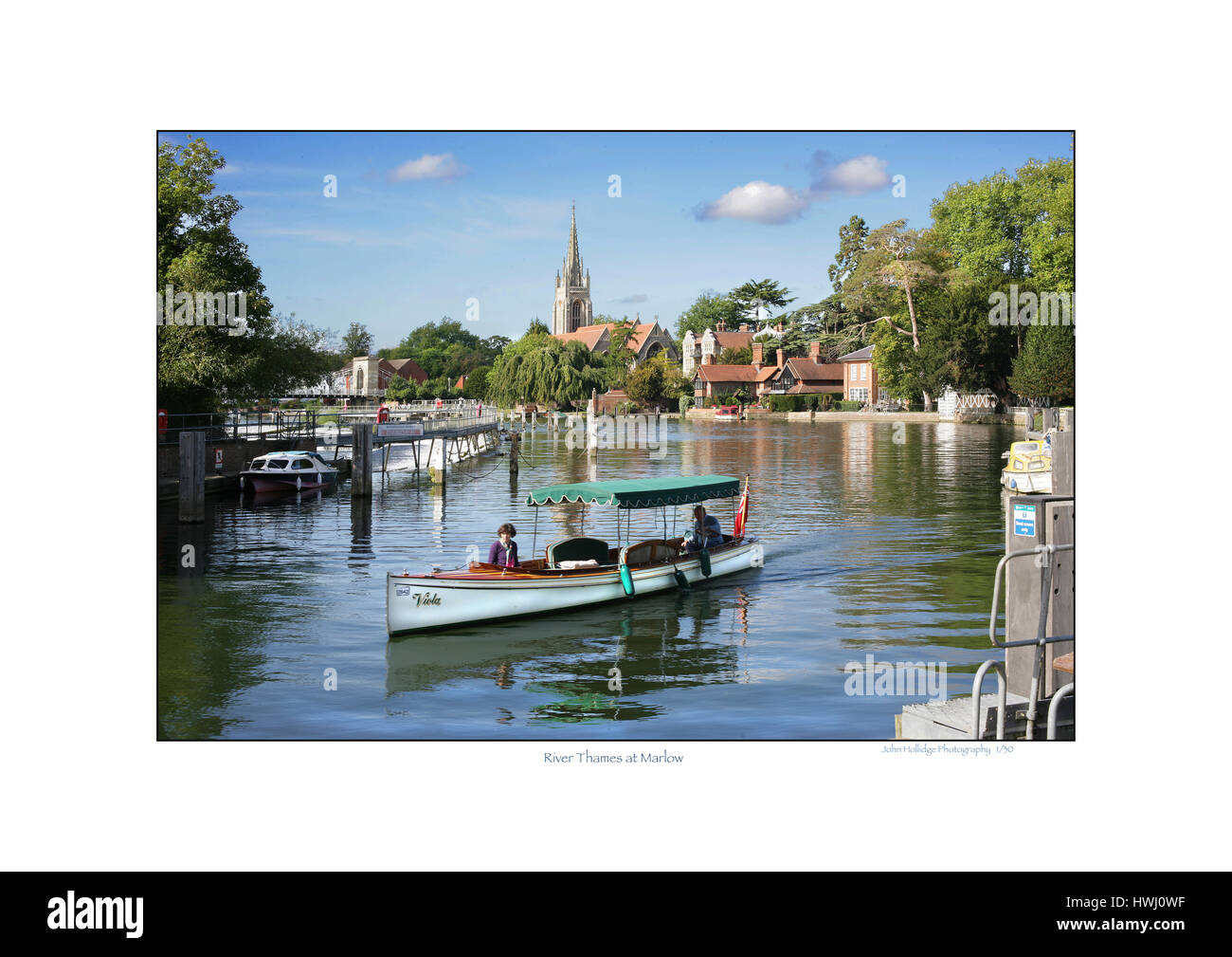 Steam boat on Thames at Marlow approaching lock Stock Photo