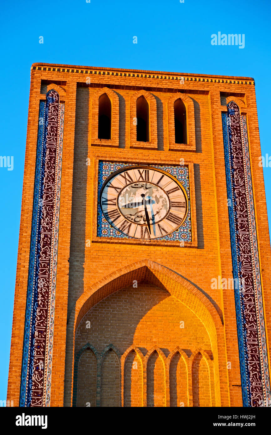 in iran old yazd city and  the antique brick    clock  tower near the sky Stock Photo