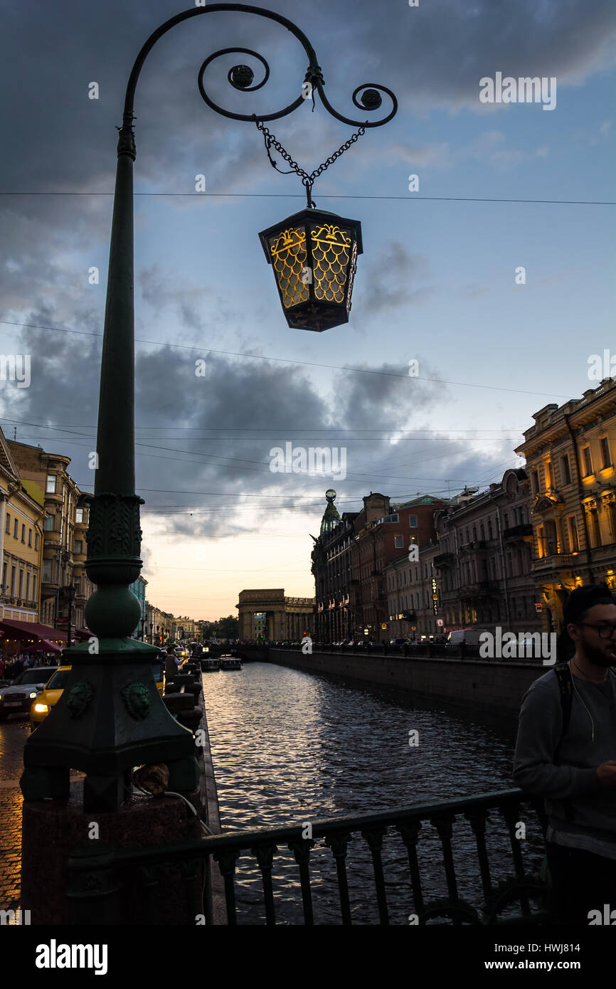 ST. PETERSBURG, RUSSIA - JULY 15, 2016: Silhouette of  old street lantern in the Italian bridge, St. Petersburg, Russia Stock Photo