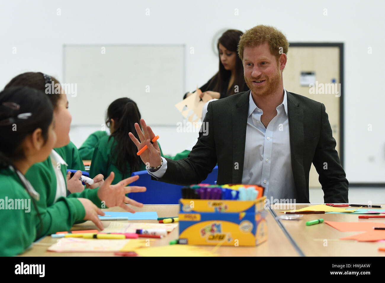 Prince Harry meets pupils on the Yes You Can personal development project, which works to help under-performing Year 8 pupils to reach their full potential, during a visit to Hamilton Community College in Leicester. Stock Photo
